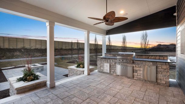 Outdoor patio with a kitchen area