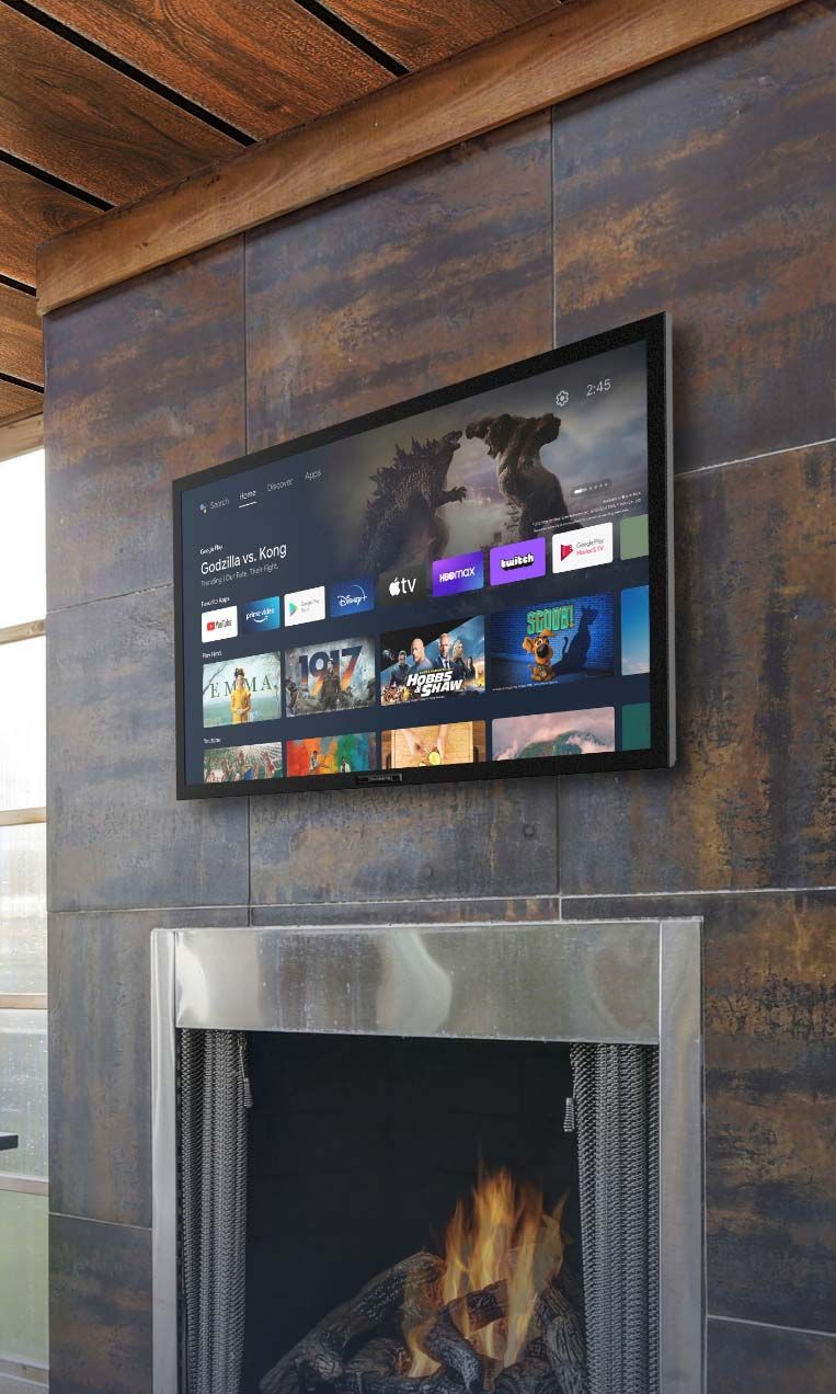 outdoor tv over a stone fireplace